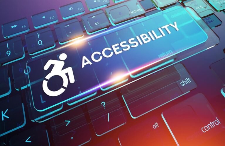 Close-up of a computer keyboard featuring a prominent key labeled "ACCESSIBILITY" with a wheelchair symbol, emphasizing inclusivity.